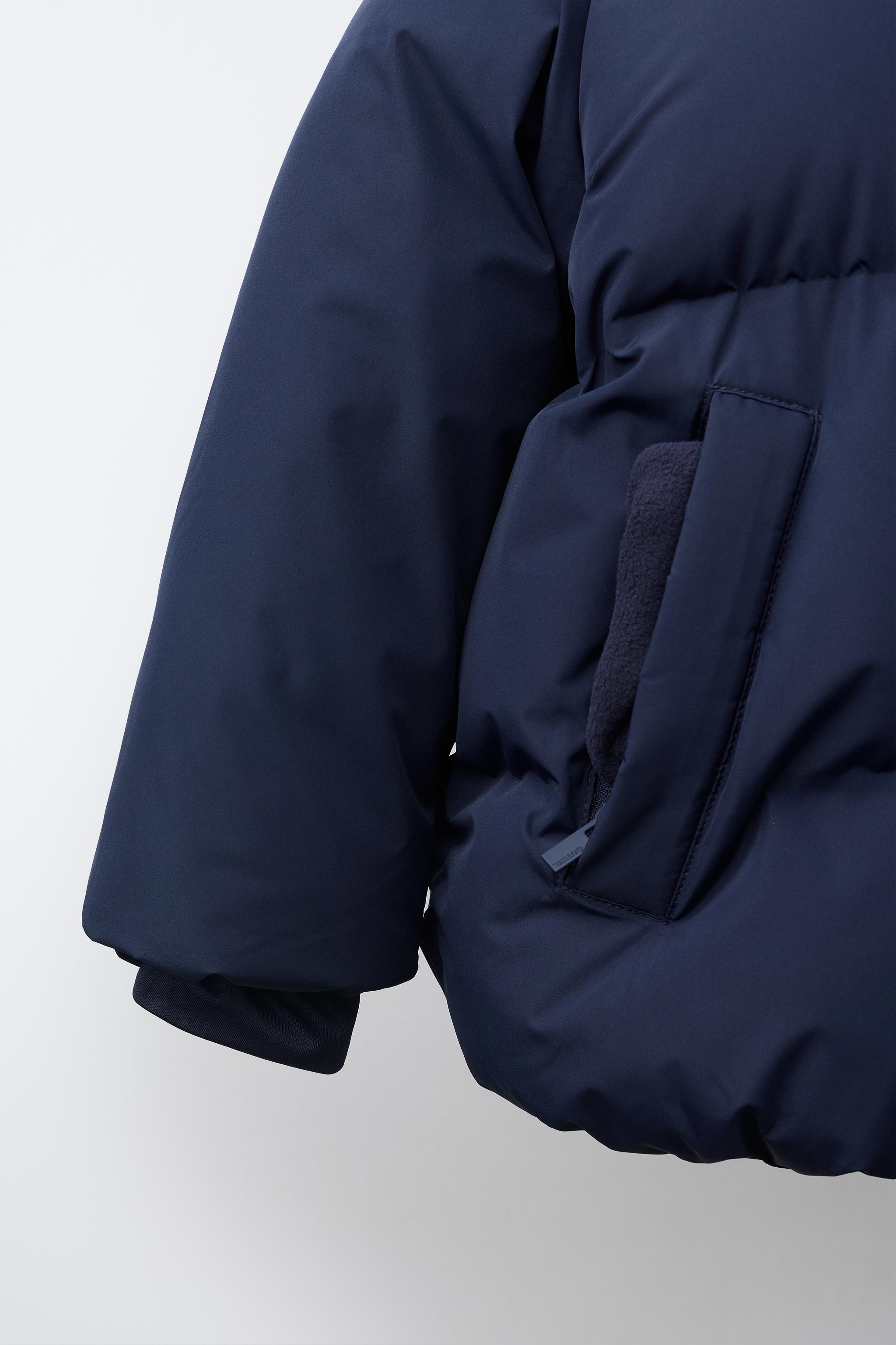 MANTEAU MATELASSÉ À CAPUCHE DÉPERLANT